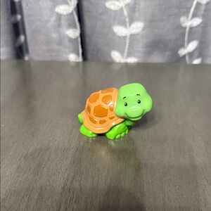 Green and Orange Turtle Action Figure